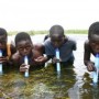 Kids using Lifestraw